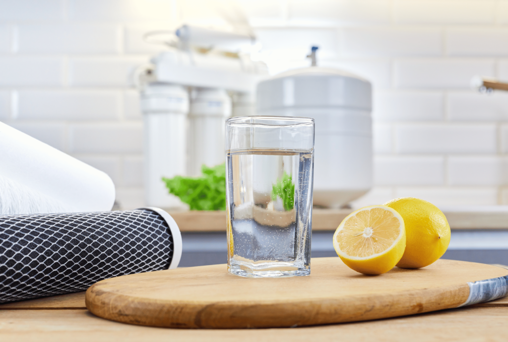 Water Filtration system and a glass of clean water