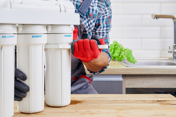 Using RO wrench to remove filter housings